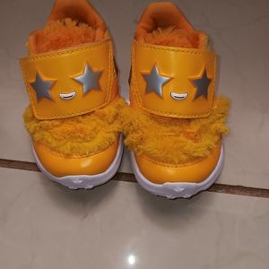 Yellow Nike fast and furry toddler shoes size 5